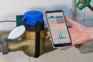 hydropmeter auf dem Wasserzähler und hydrop App